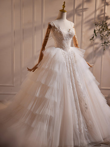 files/ElegantSpaghettiStrapsLayeredBeadingWeddingDress_1.jpg